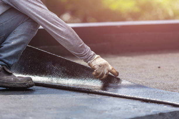 Professional Waterproofing technician working in Etowah, NC